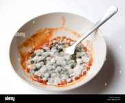 mouldy-baked-beans-in-bowl-with-fork-BBP9D8.jpg