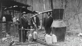 officials-posing-with-moonshine-still-bettmann.jpg