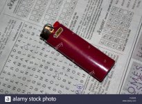 news-paper-crossword-red-lighter-red-bic-lighter-FJ2E43.jpg
