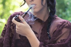 Gina Roode Smoking a Pipe in the Forest