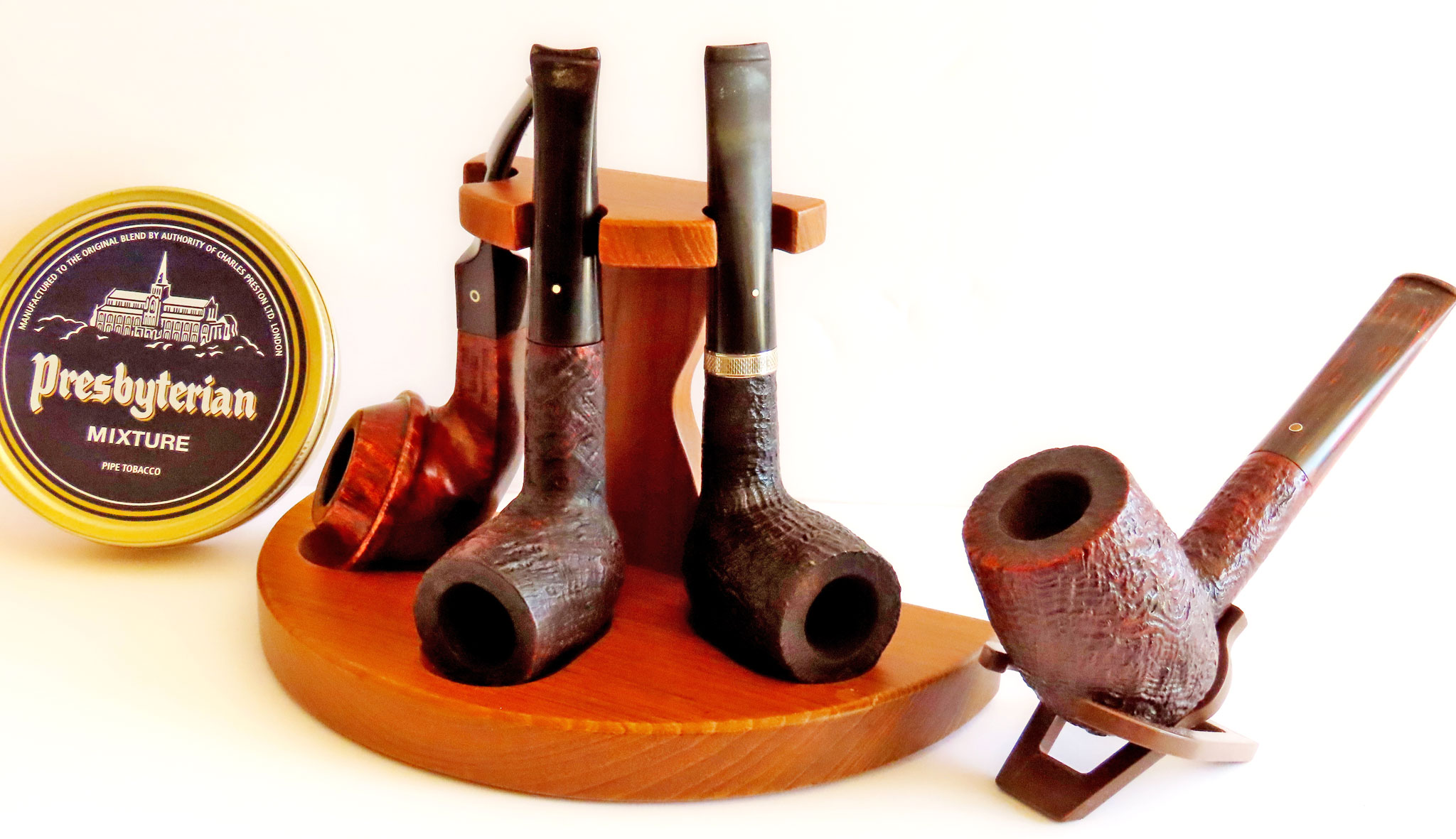 English pipes from left to right Northern Briars Countryman, Dunhill Shell Briar Group 4, Dunhill Shell Briar Group 5, Ashton Pebble Grain LX