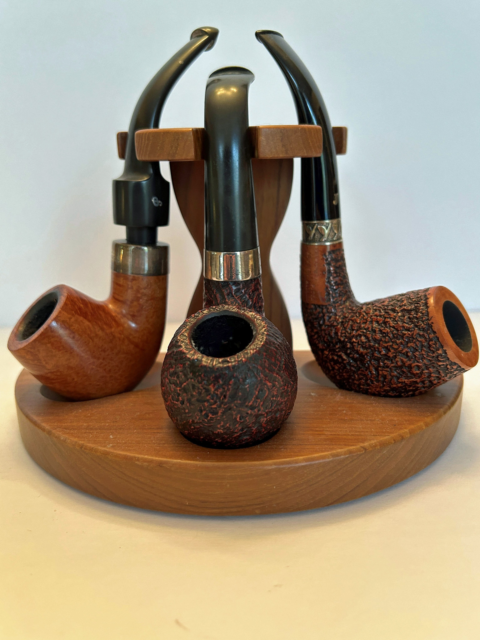 If there ever were seasons of a three-pipe problem, it is the ones upon us now. It takes mornings and evenings with a pipe, thankfully, to sort through it all. Helping with this are, from left, a Peterson Deluxe System, a Peterson Sherlock Holmes Lestrade, and a Ser Jacopo Picta Magritte Bent Egg. (Photo: Fred Brown)