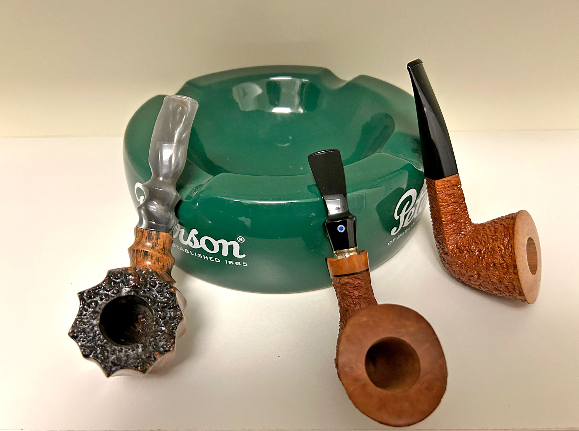 Take a closer look at your pipe collection. You will find art in the eye of the beholder. From L-R: American craftsman J.M. Boswell's freehand swirl; Ardor Fantasy in the Italian eye for detail; and the amazing art work of Claudio Cavicchi, renowned Italian pipe making master in classic designs and pipes known for the richness of the grain. Photo: Fred Brown